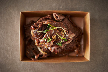 Take out Korean BBQ in paper plate 