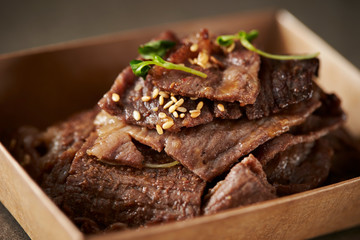 Take out Korean BBQ in paper plate 