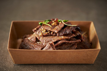 Take out Korean BBQ in paper plate 