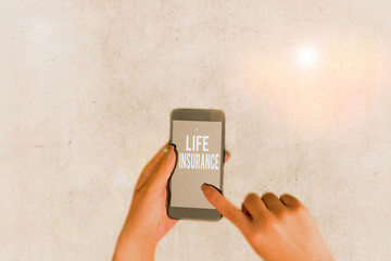 Conceptual hand writing showing Life Insurance. Concept meaning pays out a sum of money on the...