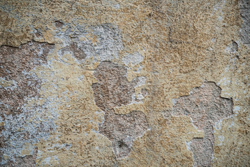 Texture of an old wall covered with paint. Background image of a worn paint coated surface