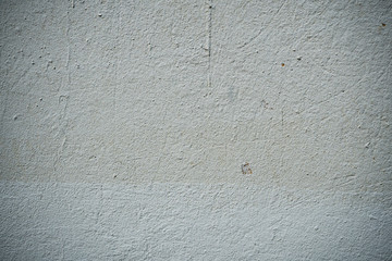 Texture of an old wall covered with paint. Background image of a worn paint coated surface