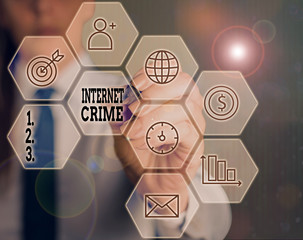 Writing note showing Internet Crime. Business concept for crime or illegal online activity...
