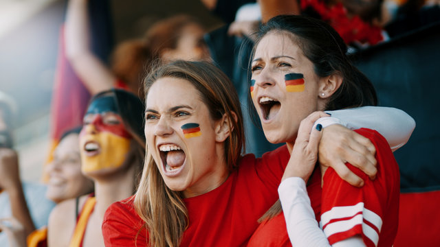 German spectators cheering at sports event
