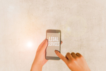 Conceptual hand writing showing Legal Services. Concept meaning any services involving legal or law...