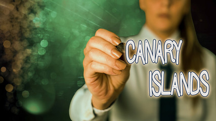 Conceptual hand writing showing Canary Islands. Concept meaning a group of mountainous islands in...
