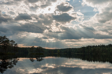 Sunrise over the lake with the reflection in the water, long shutter speed