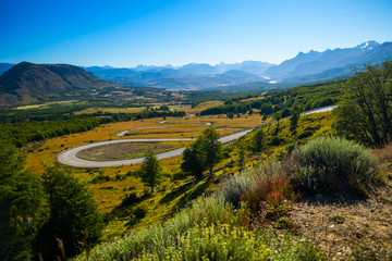 Curved asphalt road named Carretera Austral (Southern Highway) in Chilean Patagonia. Mountain pass near the Cerro Castillo mountain