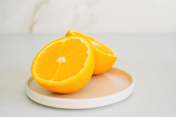 Fototapeta na wymiar Orange slices on a plate