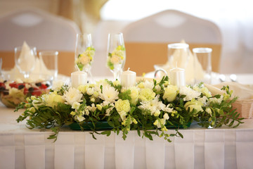 Different wedding decoration with flowers.	