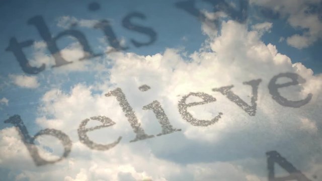 Creative time laps video of moving clouds and moving words close-up believe, truth and love. The idea of God, the higher mind, awareness.