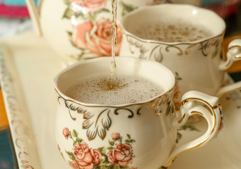 Green tea in pretty porcelain cups