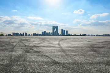 Empty asphalt road and beautiful city skyline in Suzhou