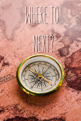 top view of golden compass on map near where to next letters © LIGHTFIELD STUDIOS