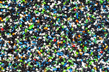 Fototapeta na wymiar Shredded Recycled Plastic Background Environmental Concept