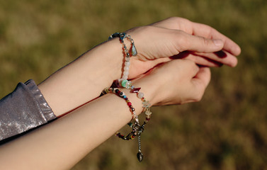 Stone bracelet handmade.Semi-precious stones bracelet. Bracelet on the hand close-up. Every day...