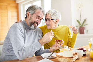 senior couple breakfast home food lifestyle eating table