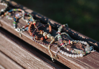 Stone bracelet handmade.Semi-precious stones bracelet. Bracelet on the hand close-up. Every day accessories. Selective focus.hands in the shape of heart