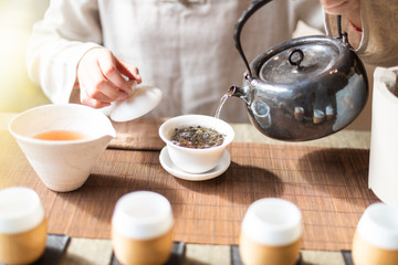 Fototapeta na wymiar Chinese pouring tea