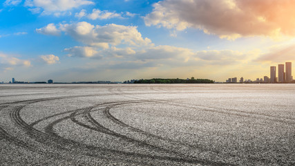 Empty asphalt road and beautiful city skyline in Suzhou