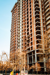 Construction of a high-rise building. Construction site in the city centre