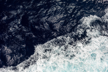 top view of the ocean with large waves from the ship. sea background.