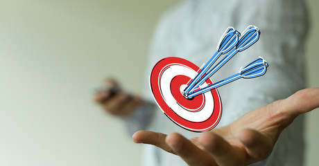 Dart arrow on target dartboard, Business success concept..