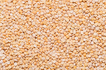 Yellow peas close up, textured background