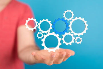 Business, Internet and technology concept. Business select gear icon on virtual screen.