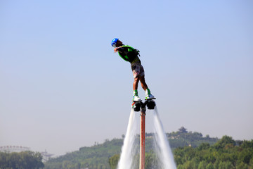 Water stunts performance in a park