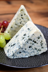 Cheese collection, strong Danish blue cheese Danablu with blue mould.