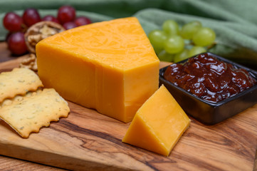 Cheese collection, yellow matured cheddar cheese triangle piece from England
