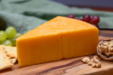 Cheese collection, yellow matured cheddar cheese triangle piece from England