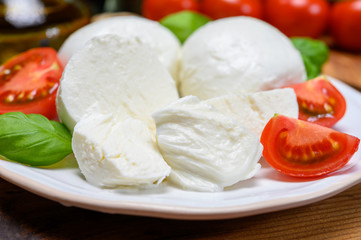 Cheese collection, white italian mozzarella cheese balls for salad or for appetizer snacks from deli shop in New York, USA
