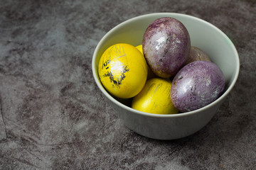 easter colored eggs in a plate and place for text