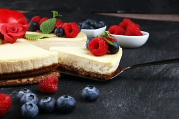 Homemade cheesecake with fresh raspberries and mint for valentines day - healthy organic summer dessert pie cheesecake. Vanilla Cheese Cake for dessert