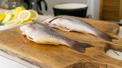 fresh fish on a cutting board