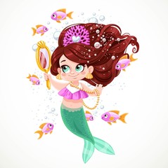 Cute little mermaid girl in coral tiara admires herself in the mirror isolated on white background