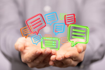 Digital icons with colorful dialog speech bubbles.