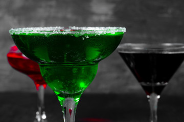 Beautiful alciohol cocktail on dark stone table