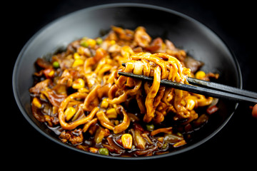 Jajangmyeon, noodle dish topped with black sauce