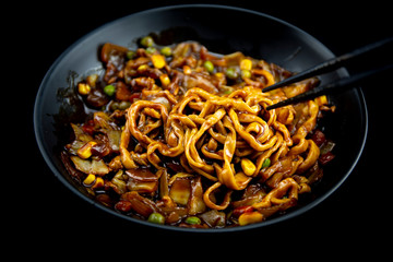 Jajangmyeon, noodle dish topped with black sauce