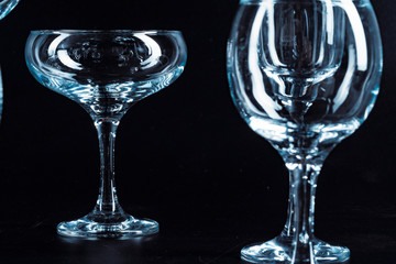 Empty  glasses for drinks on dark background