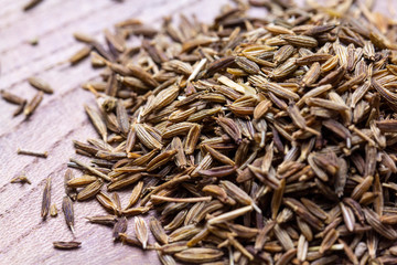 The seeds of cumin. The ingredients in the dishes. Strong smell and bitter taste. Spices.