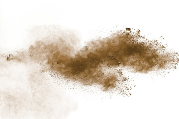 Abstract deep brown dust explosion on white background.Freeze motion of brown dust splash. - obrazy, fototapety, plakaty