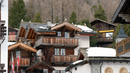 High alpine chalets near the forest