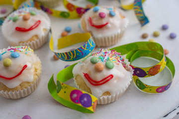 carnival clown muffins decorated with multi colored chocolate lentils