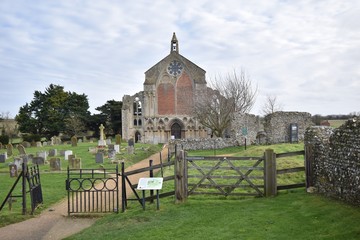 Church of St. Mary and the Holy Cross: located amongst the ruins of Binham Priorty in Norfolk, England, UK
