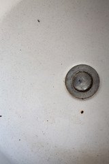 Dirty white washbasin, Clogged drain, Bathroom Cleaning concept