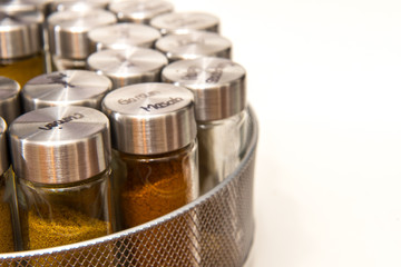 Isolated reusable spice jars on rack